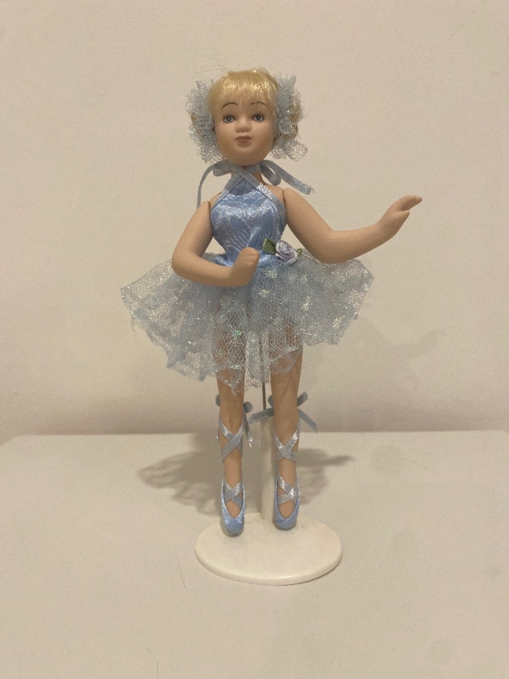 Porcelain ballerina doll with stand